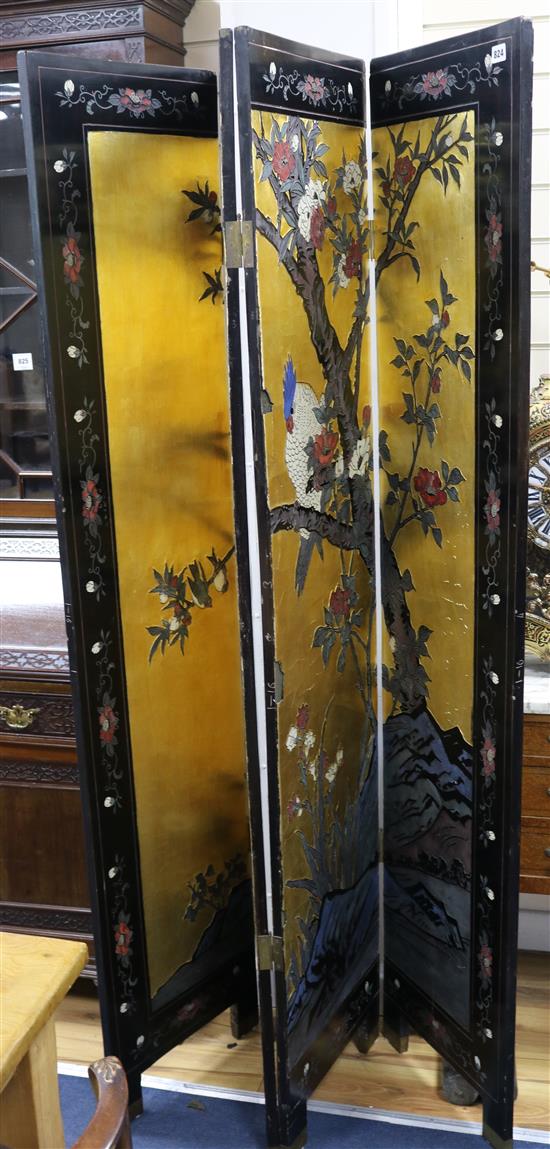 A Chinese ebonised and coromandel lacquered four fold draught screen, W.164cm